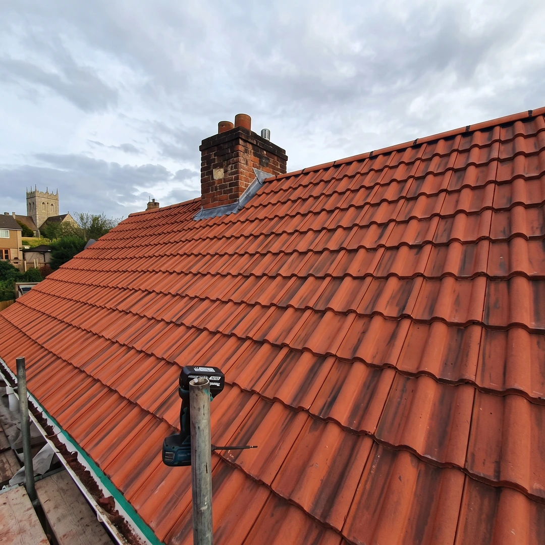 Weathershield re-roof in new clay pantiles